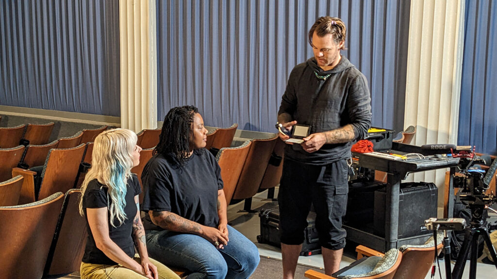 Winston Moon with Sierra Sky and Golden Sun Shyne on the set of an interview shoot.
