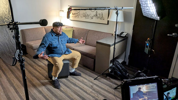Eric K Ward gestures during his interview.
